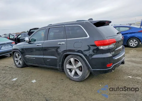 2014 Jeep Grand Cherokee Overland z USA, uszkodzony, nr VIN 1C4RJFCM4EC521167